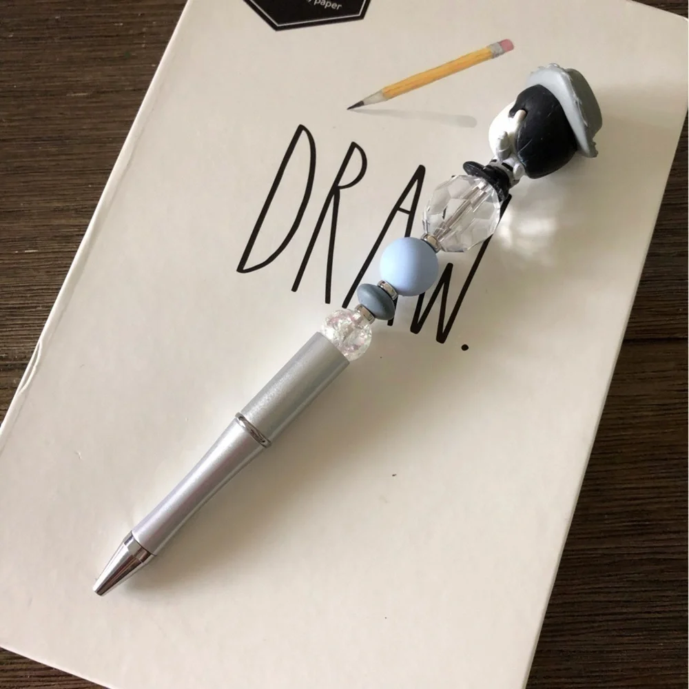 Disney doorables: Toy Story: Woody’s Round Up: Woody handmade beaded pen